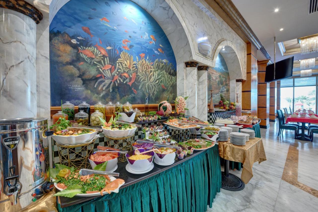 Sahara Beach Resort & Spa Шарджа Екстер'єр фото A buffet at a hotel